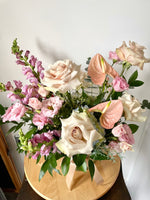 Large arrangement featuring quicksand roses